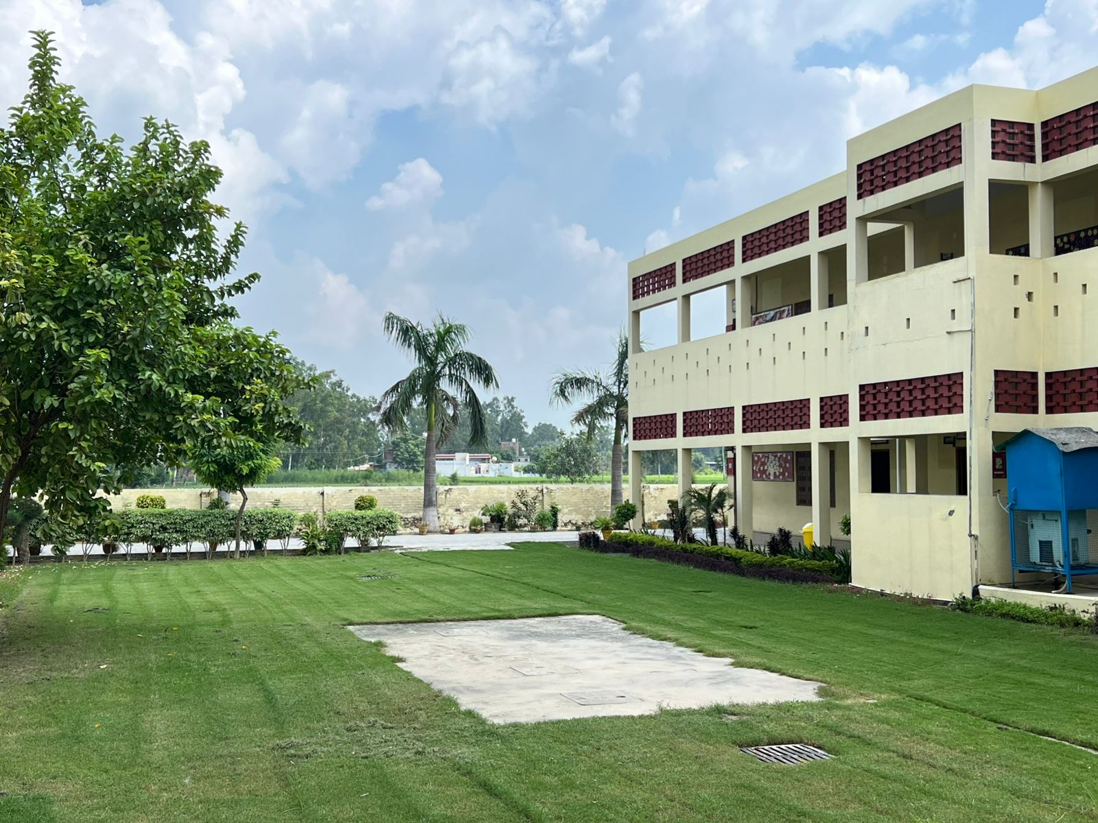 Green campus grounds and school building at Sri Hemkunt Sahib Sen. Sec. School